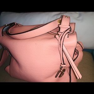 Henri bendel pink/salmon colored bow satchel
